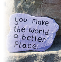 purple-painted rock with words 'you make the world a better place' engraved