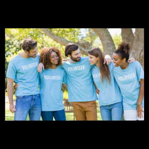 group of young adults in volunteer shirts