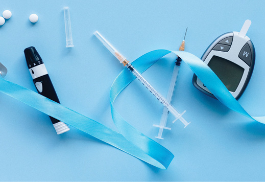 Image of insulin, syringes, and glucose monitors used by diabetics.